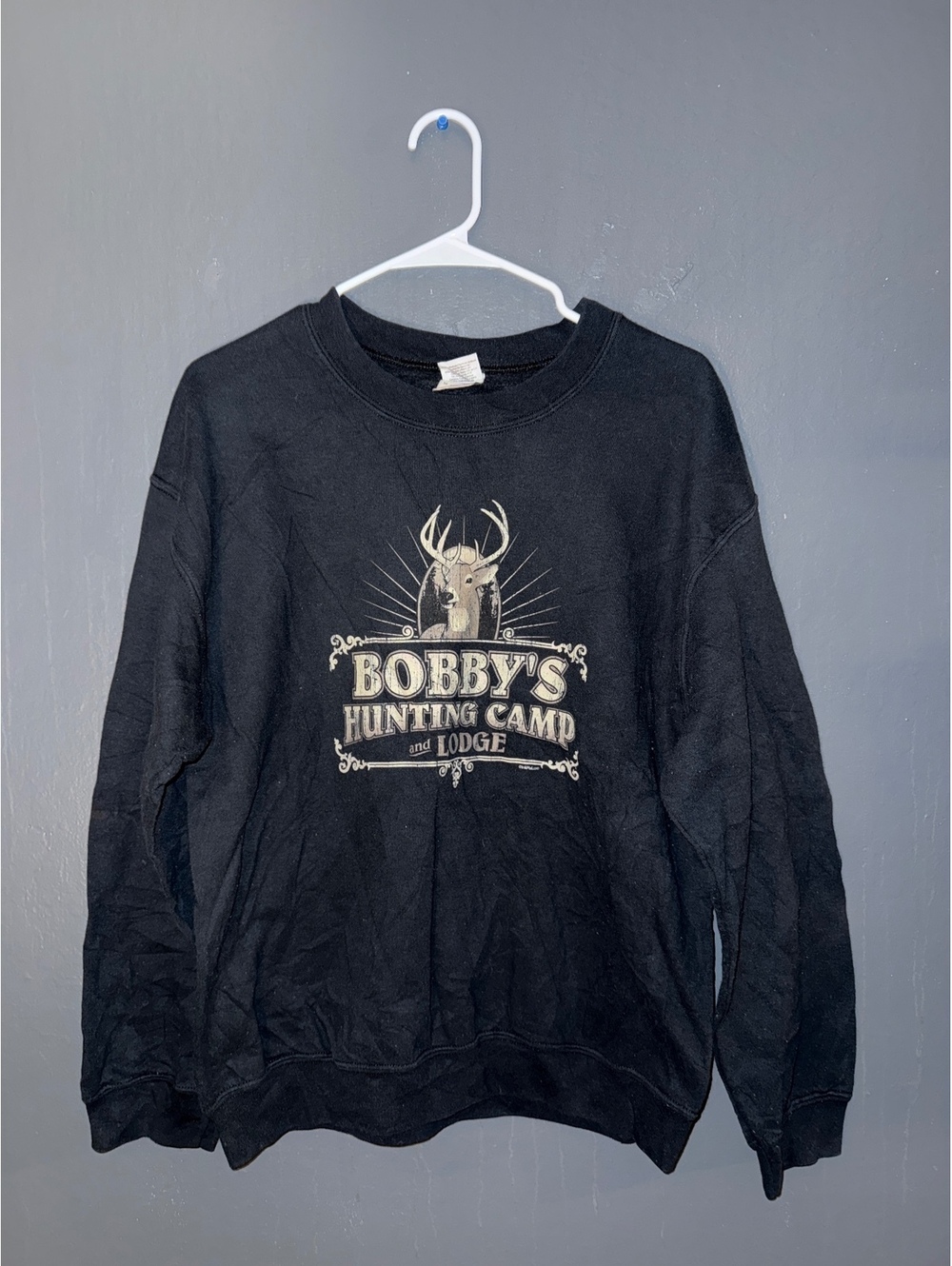 Gildan Heavy Blend Black Crewneck Sweatshirt with Bobby's Hunting Camp Graphic